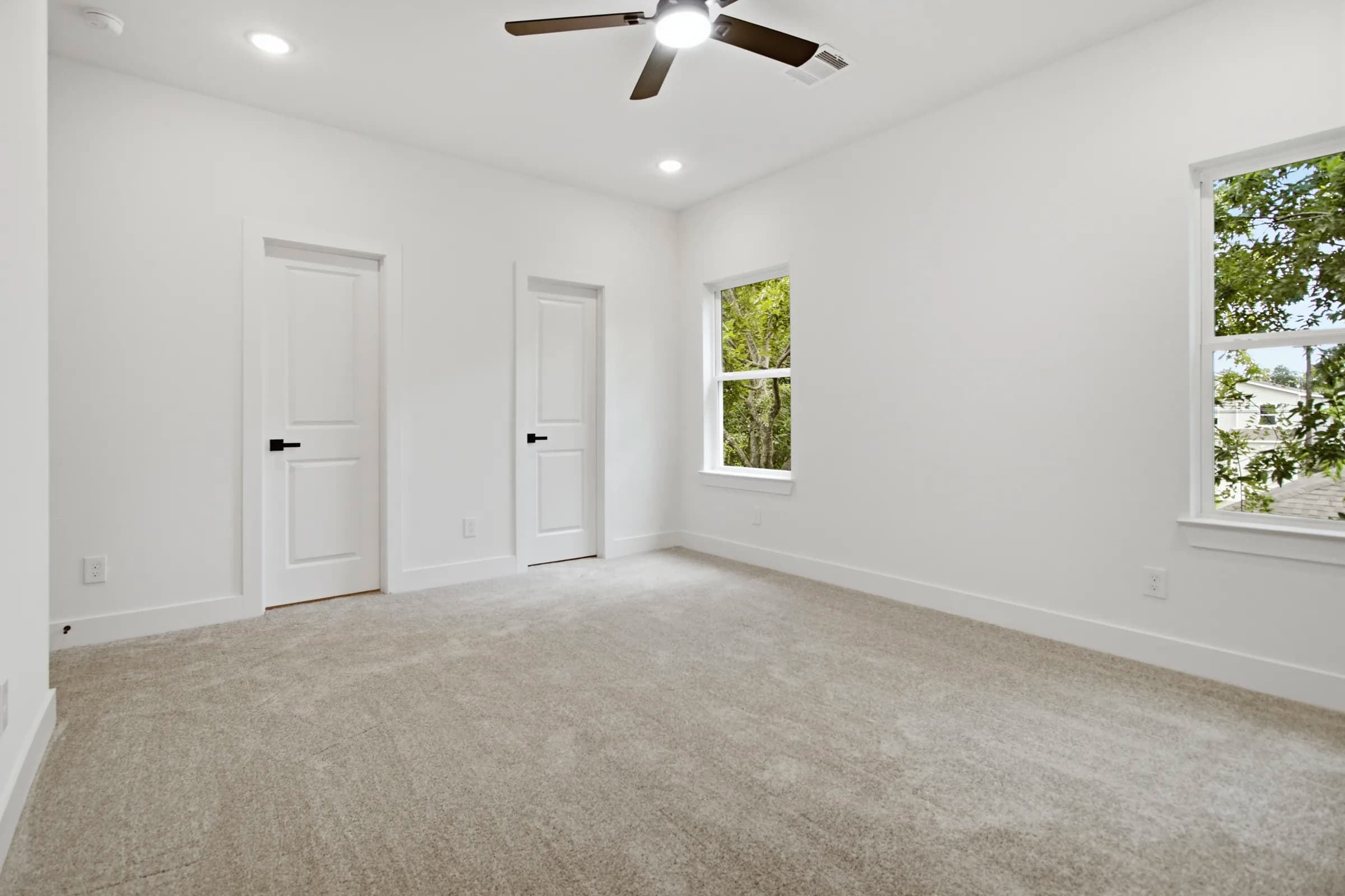 Bedroom with dual windows